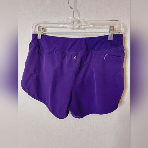 Athleta laser cutout hem purple 3" running shorts - Picture 3 of 10